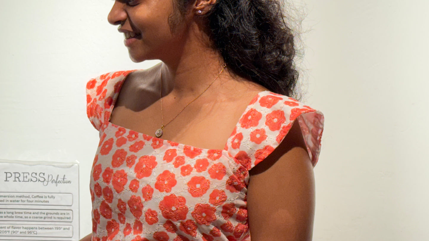 Orange Bloom Peplum Top